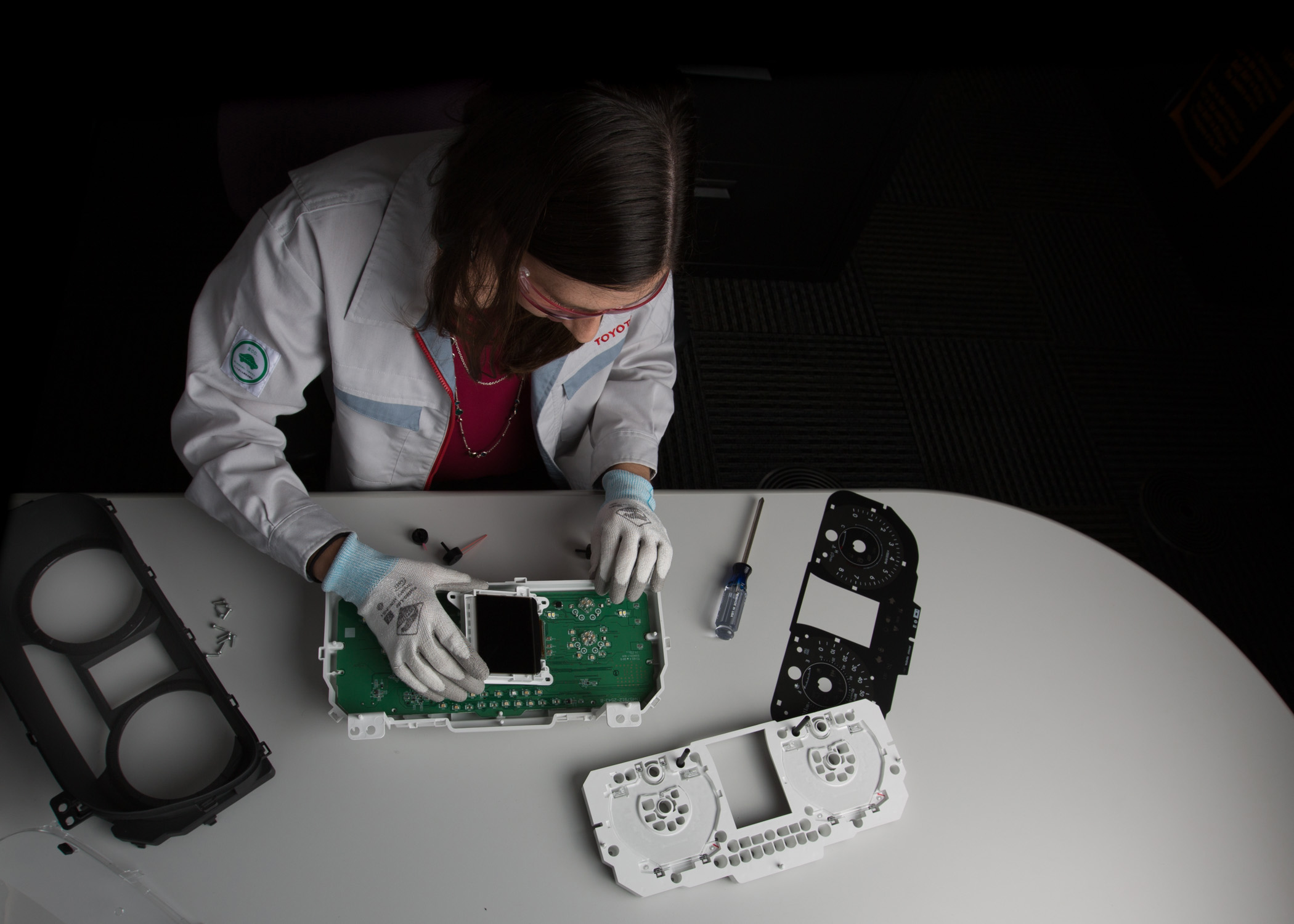 Toyota Engineer Cassie Grant works on advancing the technologies of a vehicle display meter.